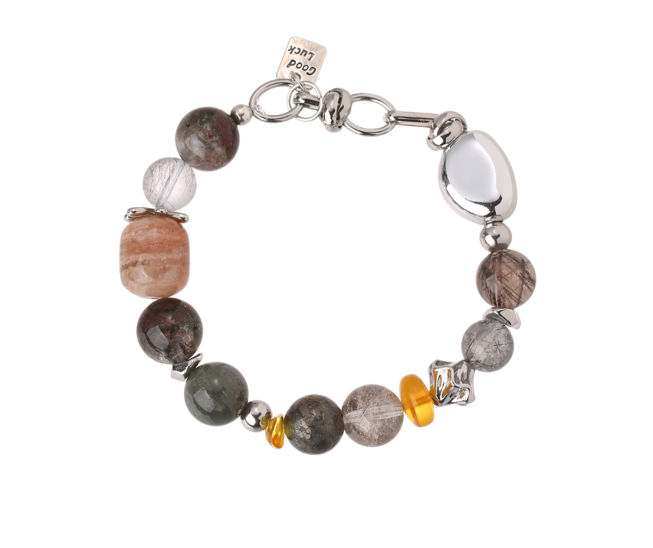 The Vault | Black Rutilated Quartz · Pyrite · Amber